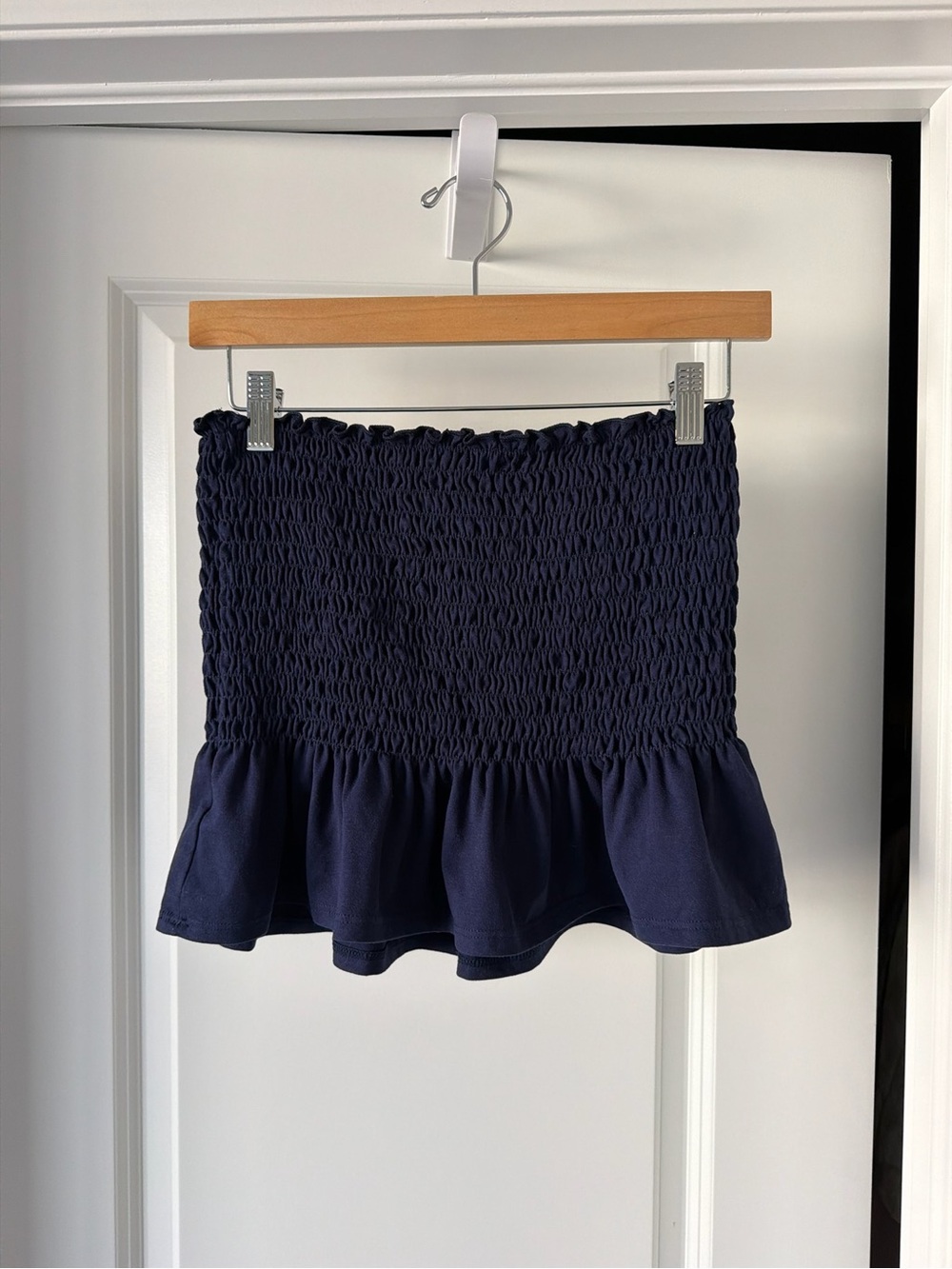 Socialite Navy Smocked strapless top with ruffled hem